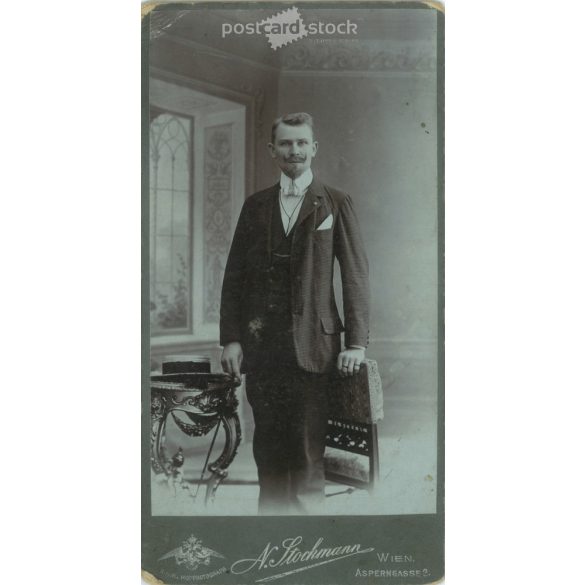 Cabinet photo taken by Nicolay Stockmann in a photo studio in Vienna. Portrait photo of Otto Ledl, with hat and walking stick, wearing a fashionable mustache. (2791800)