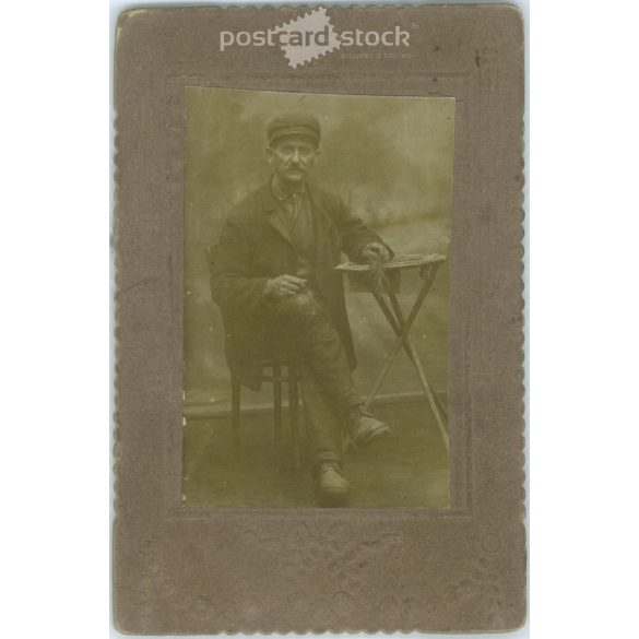 Portrait photo of a senior lower class man. Laminated on embossed hardboard. Cabinet photo / hardback photo / business card. (2791876)