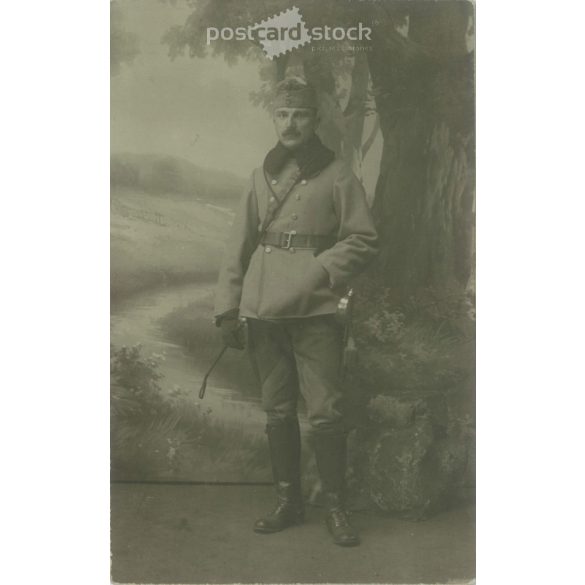 1915 – K.u.K. soldier in winter uniform with wand, full length, studio shot. Postcard, photo sheet. (2791892)