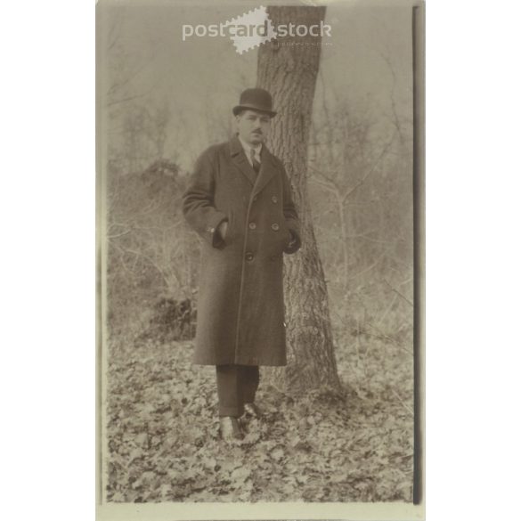 Photo of a full-length man from the 1920s in a hat and winter coat. Original paper image. Postcard, photo sheet. (2791909)