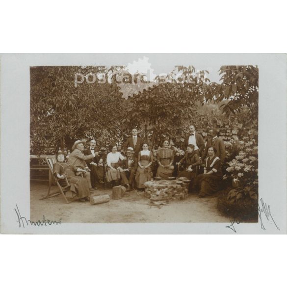 Group of friends gardening in the 1910s. Original paper image. Postcard, photo sheet. (2791924)