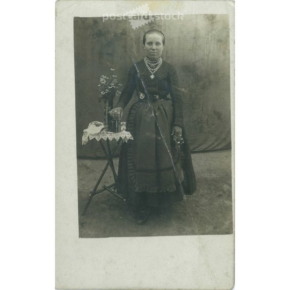 Full length photo of young woman in studio with bible. Original paper image. Postcard, photo sheet. (2791981)