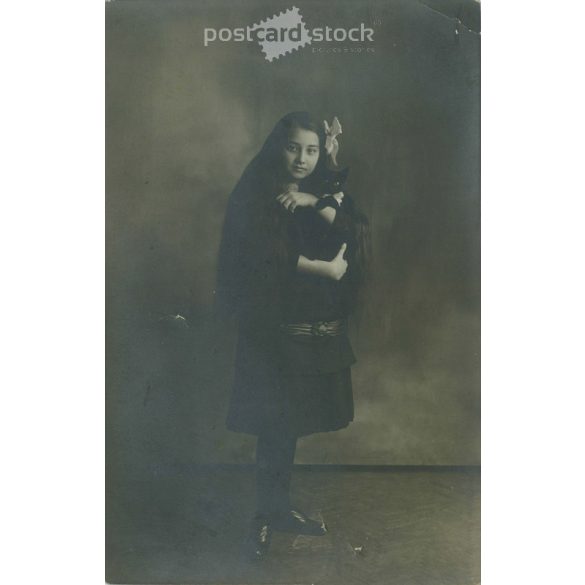 Full length photo of young girl with black kitten in studio. Original paper image. Postcard, photo sheet. (2791981)