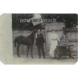   circa 1905 – Young woman with her father with a young foal going to the fair. Original paper image. Postcard, photo card. (2791995)