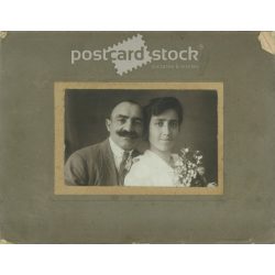   1910s. Wedding photo of a married couple. Its maker is unknown. Original, cashiered paper image. (2792255)