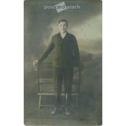   1930s. Full-length photo of an unknown young boy. It was made in the studio of Foto-lux photography company. Ráday Street, Budapest. Colored photo sheet, postcard. Original paper image. (2792278)