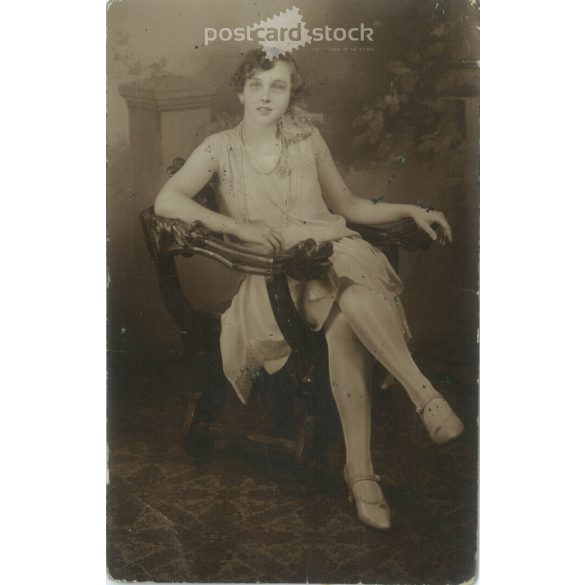 1920s. Studio photo of unknown, elegant, young woman. The creator of the image and the person in the image are unknown. Photo sheet, postcard. (2792300)