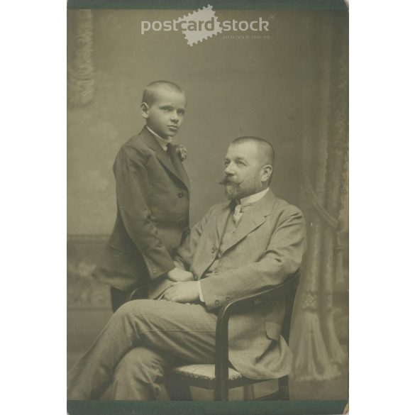 Early 1900s. Studio shot of father and son. Their identities are unknown. The photo. It was taken in the photographic studio of István Goszleth and his Son, in Budapest. Original cabinet photo / hardback photo / business card, CDV photo. (2792351)