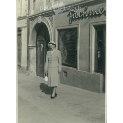   1930s. Elegant woman in a hat with a bag. Black and white old photo sheet, postcard. Cut. (2792368)