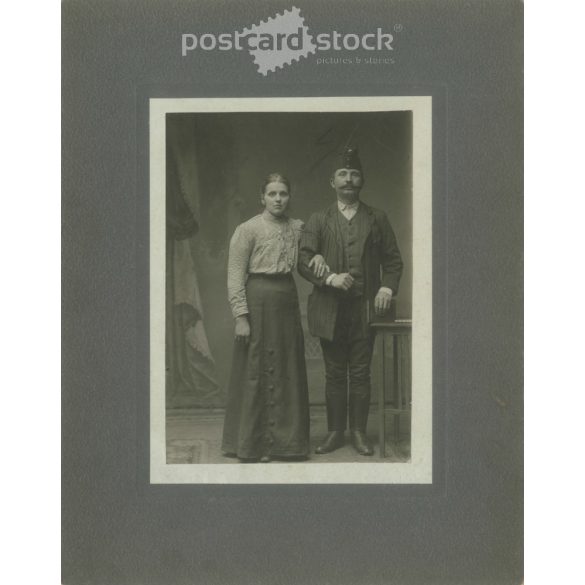 Early 1900s. Railway couple. Black and white original cashier paper image, old photo. The picture was taken by Gizella Kulcsár, in Vác. (2792409)