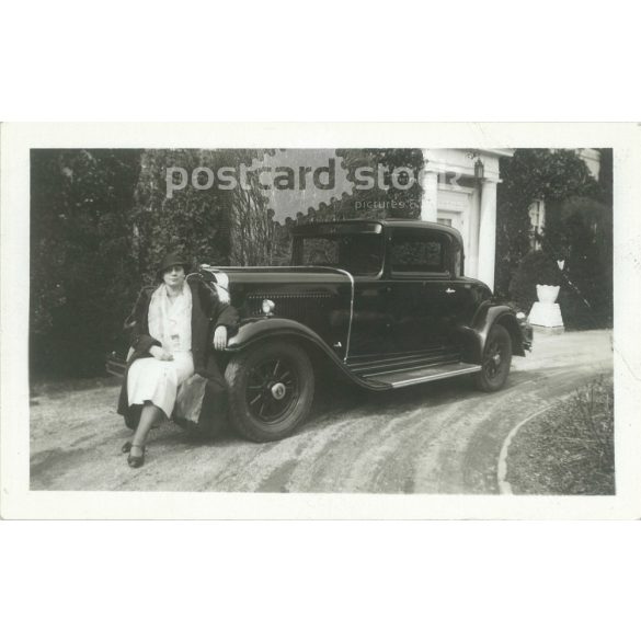 1934 – Germany. The photo was taken by the Blackman photo studio. An impressive car with an unknown lady owner. Black and white original paper image, old photo. (2792417)