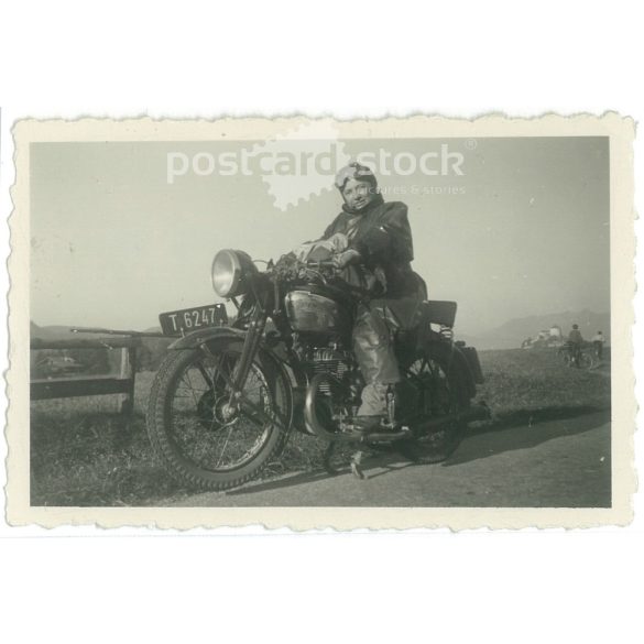 1951 – Germany. Road photo of a lady on a motorcycle. Its maker is unknown. Black and white original paper image, old photo. (2792418)