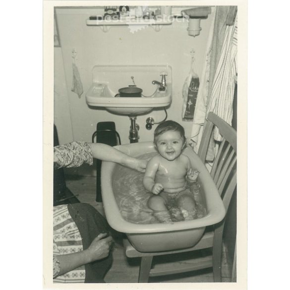 1950s. Baby shower, family photo. The picture was taken in Germany. Black and white original paper image, old photo. (2792423)