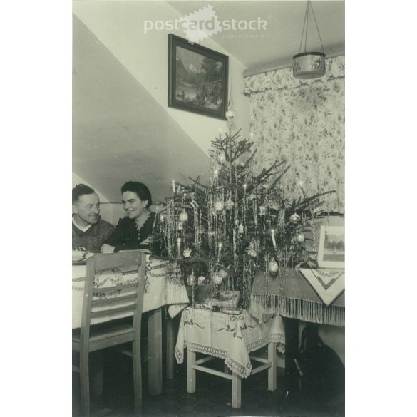 1950s. Germany. Christmas together. Its maker is unknown. Black and white original paper image, old photo. (2792444)