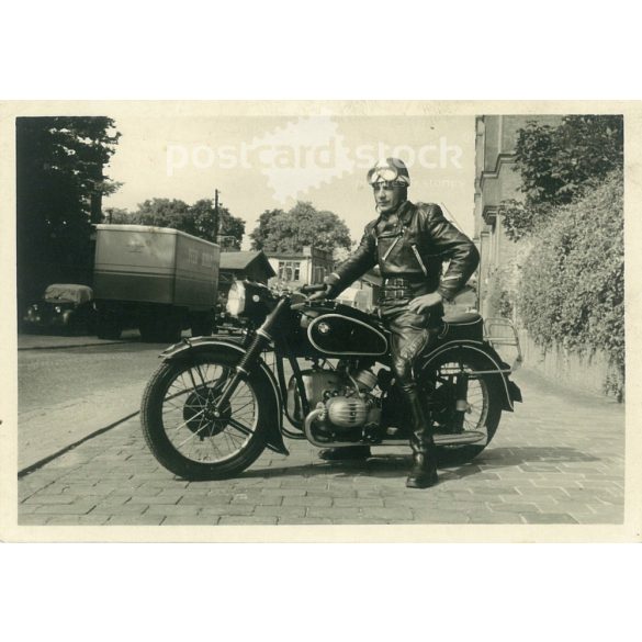 1960s. Germany. Presumably a motorcycle policeman on a BMW motorcycle. Black and white original paper image, old photo. (2792456)