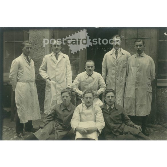 1930s. Germany. Employees of a company in work clothes, group photo in the yard. Original paper image, old postcard, photo sheet. (2792471)