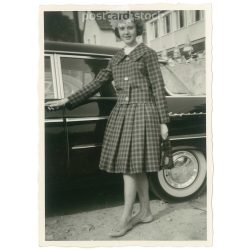   1950s. Germany. An elegant lady, next to an elegant car. Black and white original paper image, old photo. (2792472)