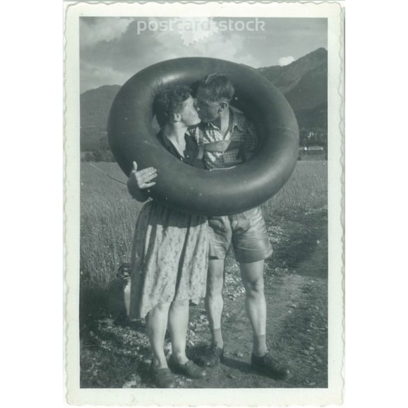 1940s. Austria. Kiss. The creator of the picture and the identity of the people on it are unknown. Black and white original paper image, old photo. (2792510)