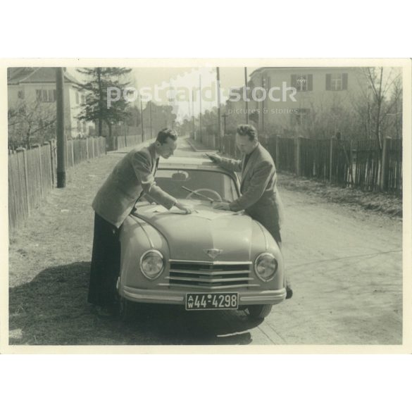 1954. Germany. Road definition on a map. The creator of the picture and the identity of the people on it are unknown. Original paper image, old postcard, photo sheet. (2792516)