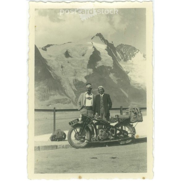 1930s. Germany. By motorbike in the Alps. The creator of the picture and the identity of the people on it are unknown. Black and white original paper image, old photo. (2792526)