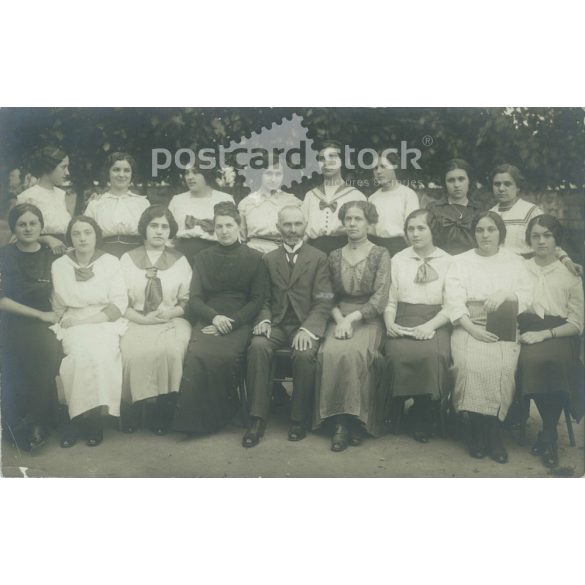 1930s. Girls class group photo. Original paper image. Black and white old photo sheet, postcard. Its maker is unknown. (2792542)