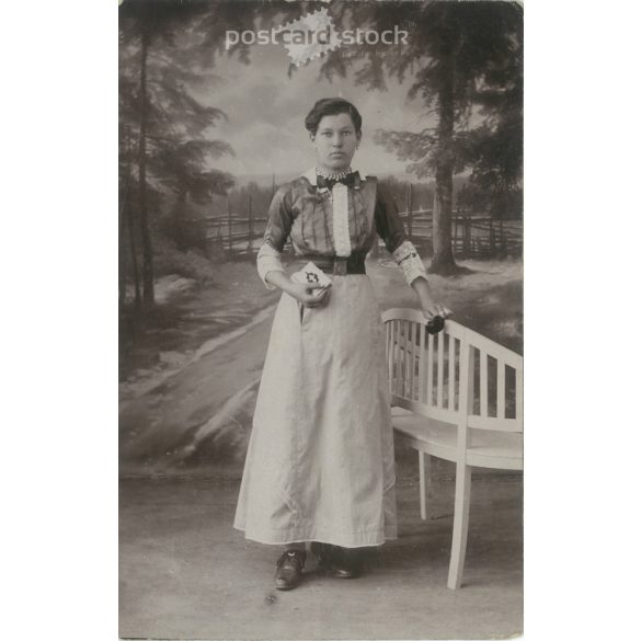 1917 – Pretty lady with flowers and Bible, studio recording. The creator of the image is unknown. Original paper image. Old photo. Black and white photo sheet, postcard. (2792563)