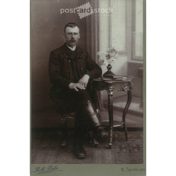 Early 1910s. Full-length studio shot of a young, wealthy man. Produced by Béla Róth’s photography studio in Szarvas. Old photo, original cabinet photo / hardback photo. (2792606)