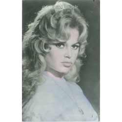   Brigitte Bardot is a French actress and singer. Colored photo sheet reproduction, offset print. Old postcard. (2792640)