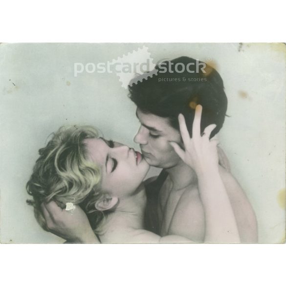 Brigitte Bardot and Alain Delon are movie stars. Original paper image. Old photo. Colored photo sheet, old postcard. (2792641)