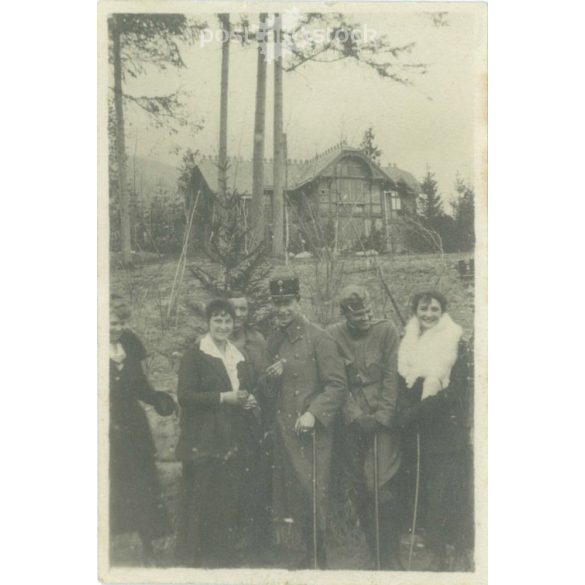 1920s. Hungary. Soldiers in the company of ladies. The creator of the picture and the identity of the people on it are unknown. Black and white original paper image, old photo. (2792666)