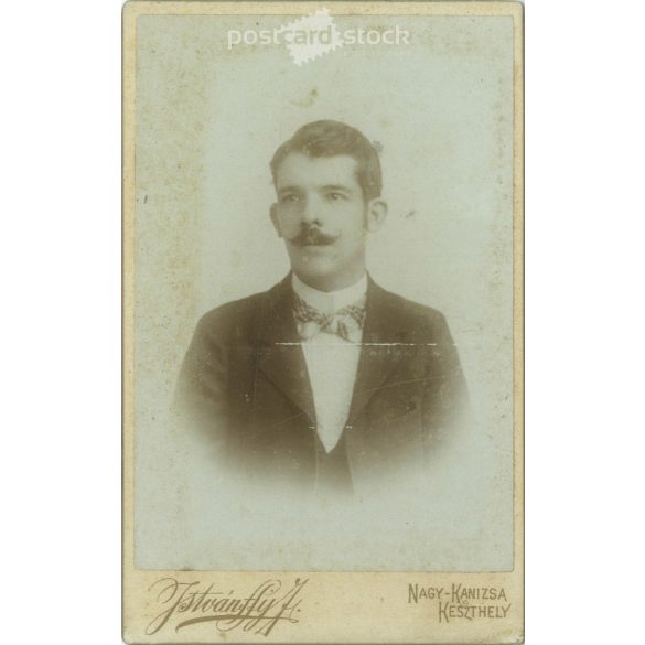 1890s. Studio photo of a young man. The person in the picture is unknown. The work of the photography studio of J. Istvánffy. Keszthely. Old photo, business card, CDV photo. (2792687)