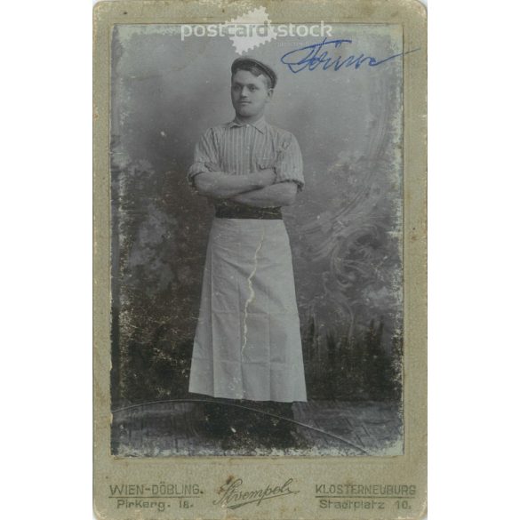 1915. Studio photo of a young apprentice. The person in the picture is unknown. The work of the photography studio Strempel. Vienna. Old photo, business card, CDV photo. (2792709)