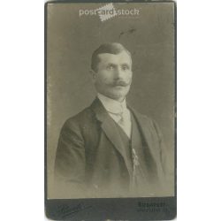   Around 1910. Studio photo of a young man. The person in the picture is unknown. The work of Rivoli photography studio. Budapest. Old photo, business card, CDV photo. (2792712)