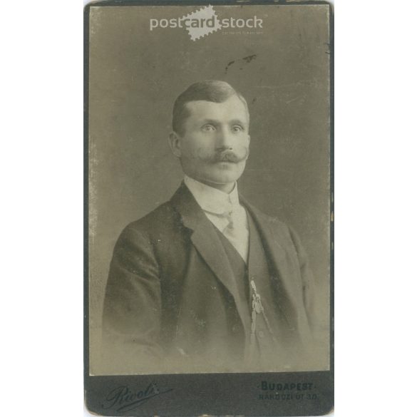 Around 1910. Studio photo of a young man. The person in the picture is unknown. The work of Rivoli photography studio. Budapest. Old photo, business card, CDV photo. (2792712)