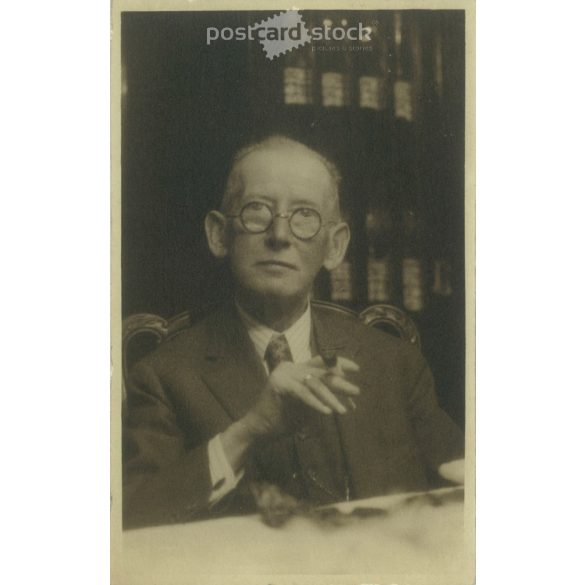 Circa 1920. Unknown English gentleman with a cigar. Original paper image. Old photo. Black and white photo sheet, old postcard. (27925714)