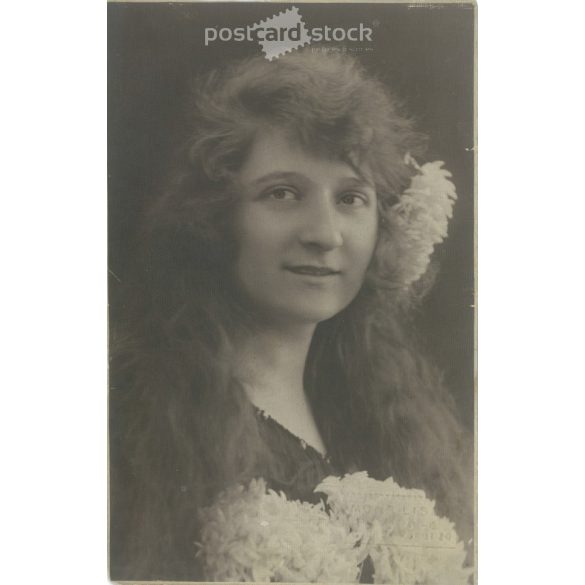 1927. Young woman with flowers. The work of the Mona Lisa photo studio. Original paper image. Old photo. Black and white photo sheet, old postcard. (2792721)