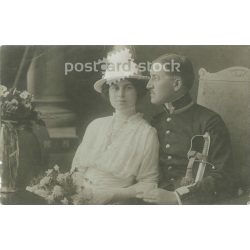   1915. Studio recording of a young couple. The persons in the picture are unknown. Produced by Károly Ellei photography studio. Úlpest. Gelatin silver. Original paper image. Old photo. Black and white photo sheet, old postcard. (27925740)