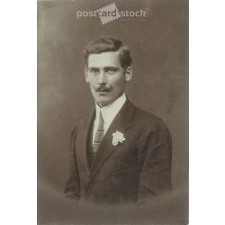   1920s. A young groom. The person in the picture and the creator of the picture are unknown. Original paper image. Black and white old photo. (27925789)