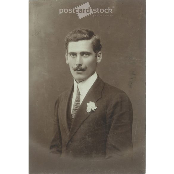 1920s. A young groom. The person in the picture and the creator of the picture are unknown. Original paper image. Black and white old photo. (27925789)