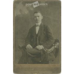   Early 1900s. Studio photo of a young man. The persons in the picture are unknown. The work of the photography studio of Lipót Ganz. Budapest. Old photo, original cabinet photo / hardback photo. (2792790)